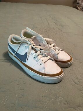 Nike White Sneakers with Light Blue Accents